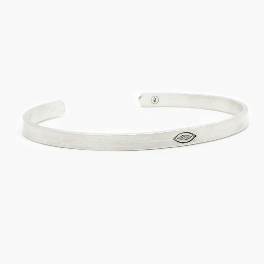 Hand-Forged Evil Eye Polished Silver Bangle-Kompsós